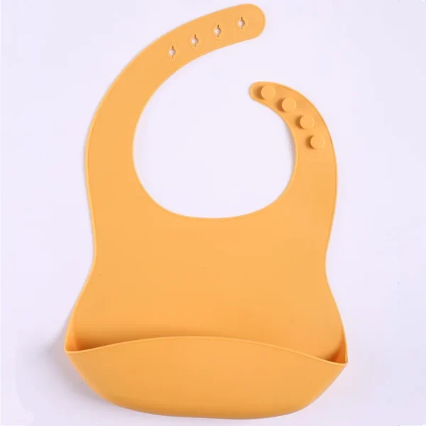 Bavoir en silicone avec attrape-bébé